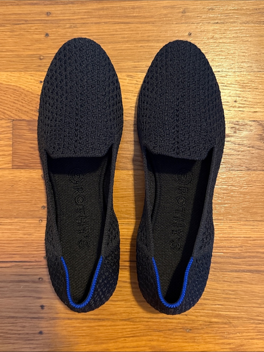 Rothy's Black Knit Slip-On Flats with Blue Trim